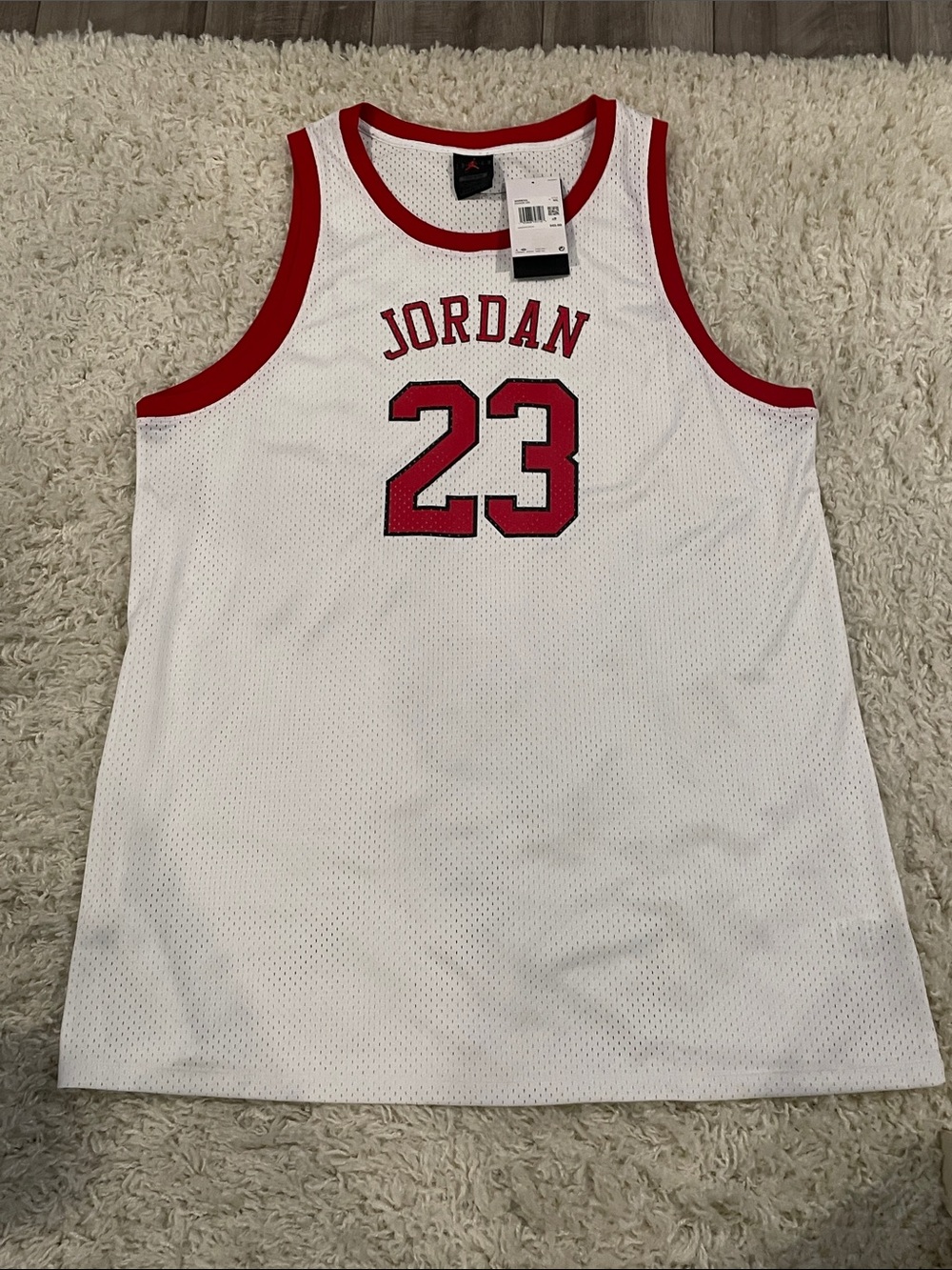 White Jordan Women's Heritage Jersey Dress featuring red trim